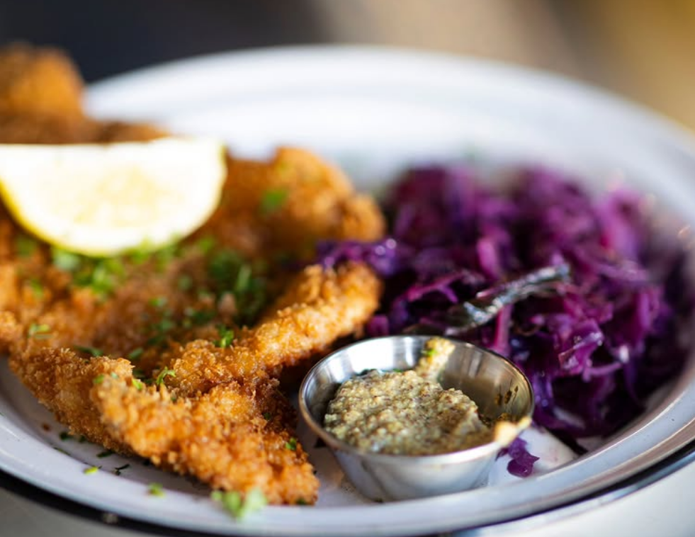 Schnitzel with melted duck fat cabbage and mustard